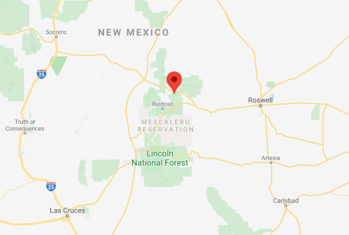 Map showing the Mescalero Reservation in New Mexico, with a red marker indicating a specific location.