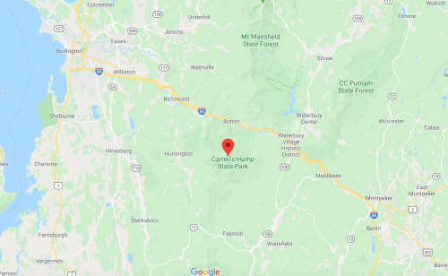 Map showing Camel's Hump State Park in Vermont, marked with a red pin, surrounded by green areas and roads.