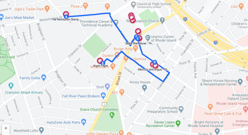 Map showing a route with marked locations including restaurants and schools in a city area.