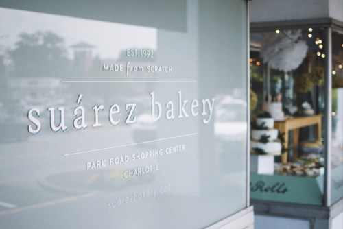 Sign for Suárez Bakery, established in 1992, located in Park Road Shopping Center, Charlotte.