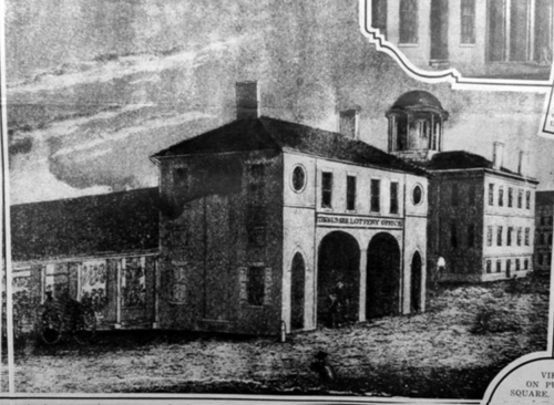 Historic black-and-white image of a lottery office building with arched entrance and surrounding architecture.