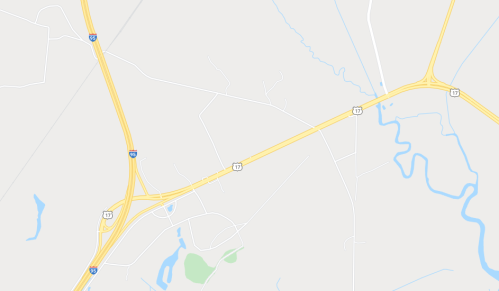 Map showing a highway intersection with roads and waterways in a rural area.