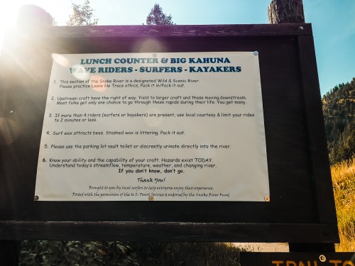 Sign detailing rules and information for lunch counter and Big Kahuna wave riders, surfers, and kayakers on the Snake River.