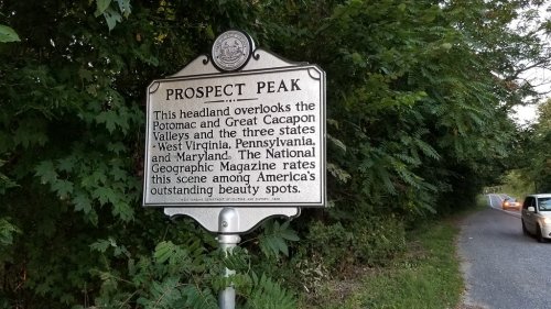 Sign for Prospect Peak, highlighting views of Potomac and Great Cacapon Valleys and three states: WV, PA, MD.