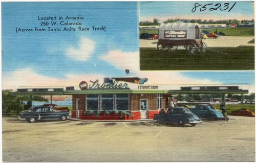 Postcard of The Frontier Coffee Shop in Arcadia, with a vintage car and a wagon in the foreground, and a race track nearby.