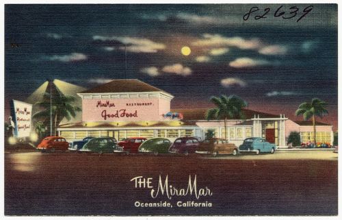 Vintage postcard of Mira Mar Restaurant in Oceanside, California, featuring classic cars and a nighttime scene.