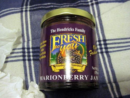 A jar of Marionberry jam with a purple label, featuring the text "Fresh to You" and "The Hendricks Family."