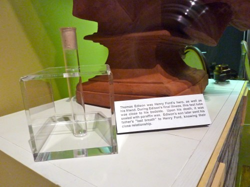 A glass tube encased in a clear block, with a plaque about Thomas Edison and Henry Ford's friendship.