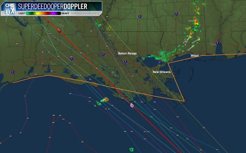 Weather radar map showing storm activity near Baton Rouge and New Orleans, with tracking lines and precipitation indicators.