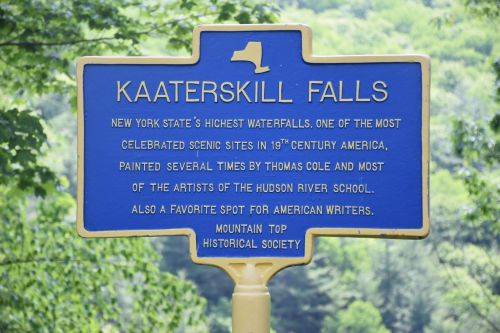 Sign about Kaaterskill Falls, highlighting its status as a historic waterfall and artistic site in 19th century America.