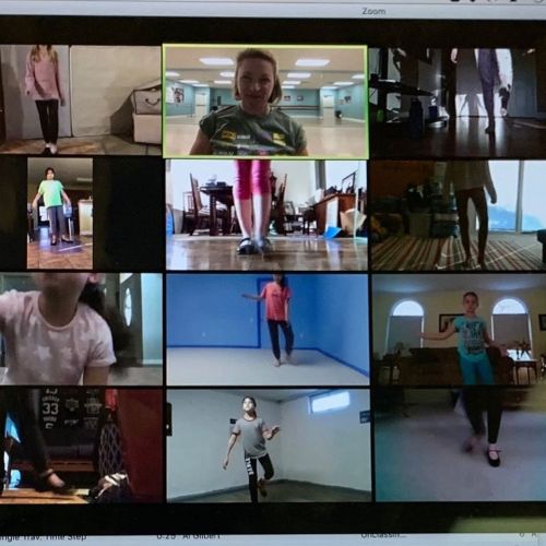 A grid of participants in a virtual dance class, each dancing in their own space on a video call.
