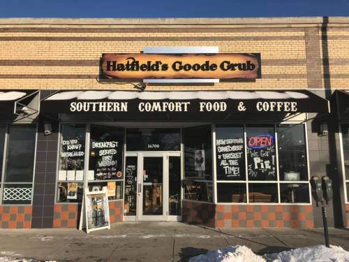 Exterior of Hatfield's Goode Grub, a Southern comfort food and coffee restaurant, with a welcoming "Open" sign.