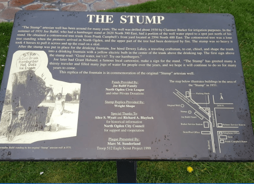 A plaque titled "The Stump," detailing its history and significance, with images and text about its origins and restoration.