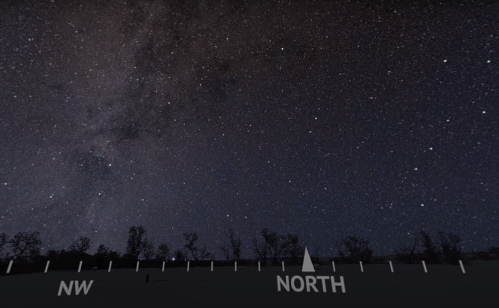 A starry night sky with the Milky Way visible, labeled with cardinal directions: NW, N, and a pointer to North.