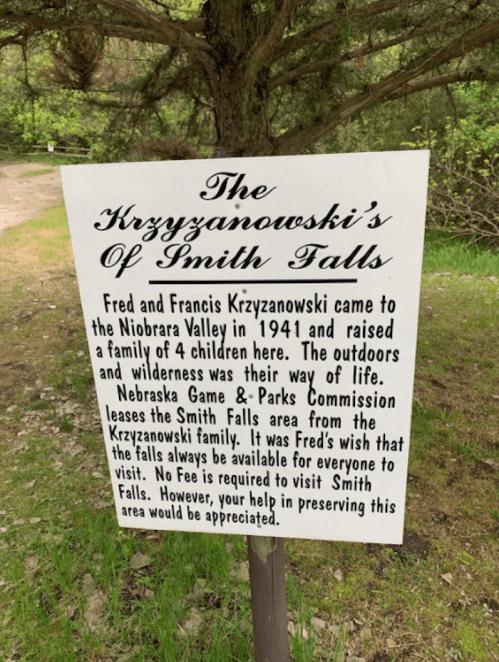 Sign about the Krzyzanowski family, who settled in Smith Falls in 1941, highlighting their connection to the area.