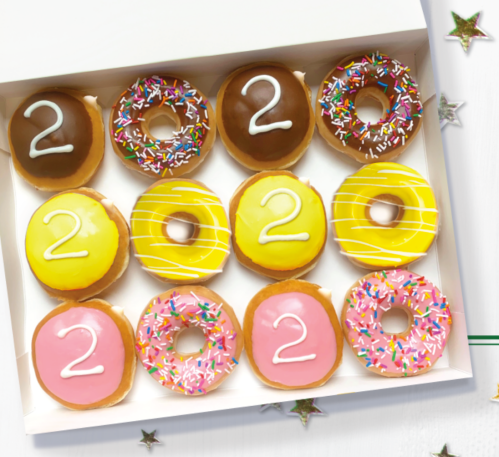 A box of twelve colorful donuts, featuring chocolate, yellow, pink, and sprinkles, all decorated with the number "2."