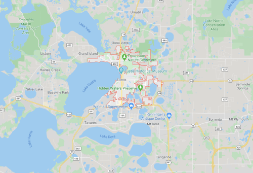 Map of Eustis, Florida, highlighting parks, museums, and local landmarks with surrounding lakes and green areas.