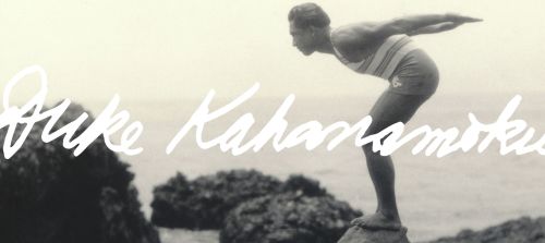 A vintage photo of a diver poised on a rock, ready to leap into the water, with the name "Duke Kahanamoku" overlaid.