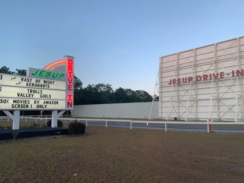 Sign for Jesup Drive-In featuring movie titles: "Vast of Night," "Aeronauts," "Trolls," "Valley Girls," and "Screem."