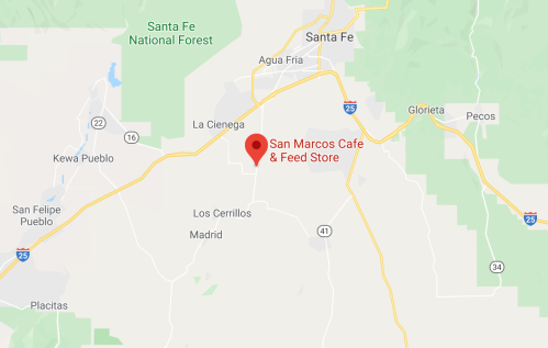 Map showing the location of San Marcos Cafe & Feed Store near Santa Fe, New Mexico, with nearby landmarks and roads.