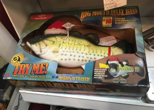 A boxed Big Mouth Billy Bass toy with a Santa hat, featuring motion activation and a "Try Me" button.