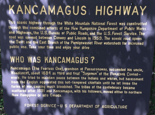 Sign about Kancamagus Highway, detailing its history and connection to Kancamagus, a Native American leader.
