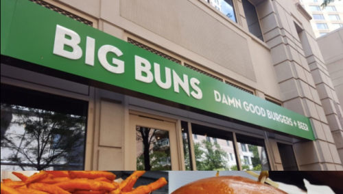 Sign for "Big Buns" restaurant featuring burgers and beer, with sweet potato fries and a burger in the foreground.
