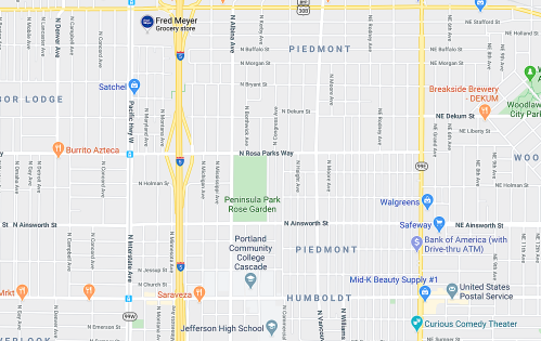 Map showing streets and landmarks in the Piedmont neighborhood of Portland, Oregon, including parks and businesses.