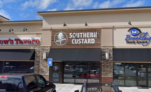 Exterior view of a shopping plaza featuring the "Southern Custard" sign, with nearby businesses visible.