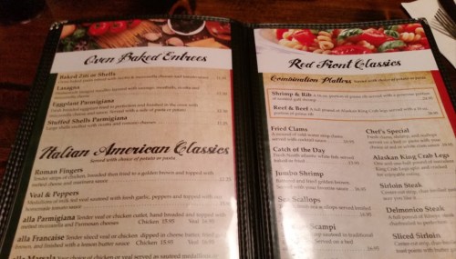 Menu pages featuring oven-baked entrees and Italian American classics, including pasta and seafood options.