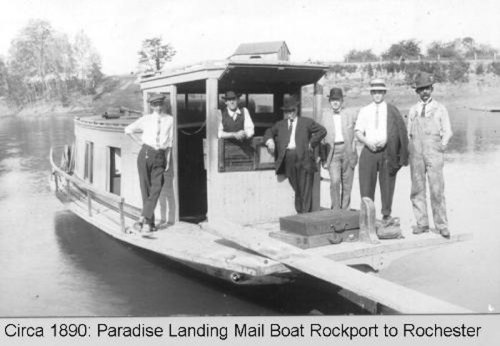 Black and white photo of six men on a mail boat, circa 1890, at Paradise Landing, Rockport to Rochester.