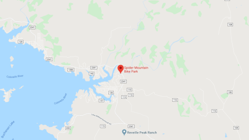 Map showing Spider Mountain Bike Park location near a lake, with surrounding roads and green areas.