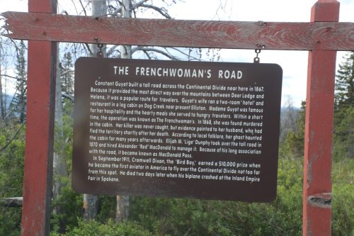 Sign detailing the history of the Frenchwoman's Road, built by Constant Guyot in 1867, near Deer Lodge, Montana.