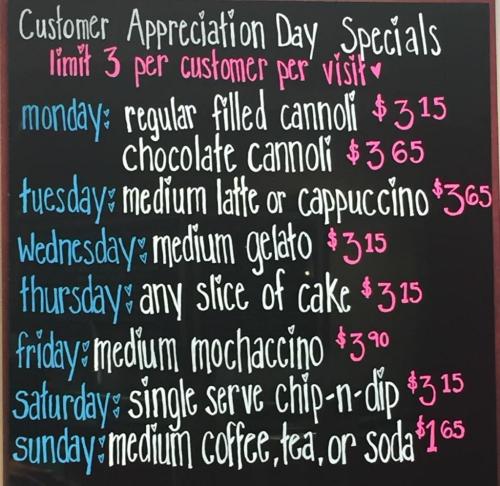 Chalkboard menu listing Customer Appreciation Day specials with prices for various treats and drinks throughout the week.