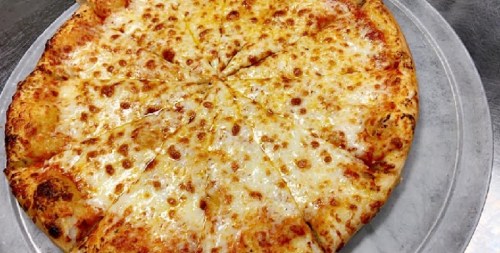 A freshly baked cheese pizza, sliced into 12 pieces, on a silver pizza tray.