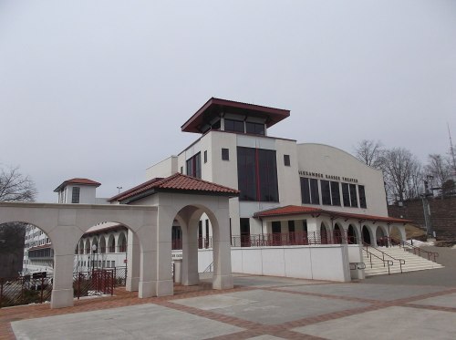 Exterior view of the Alexander Kasser Theater, featuring modern architecture and a cloudy sky.
