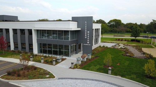Exterior view of the Lizzadro Museum, featuring modern architecture and landscaped grounds.