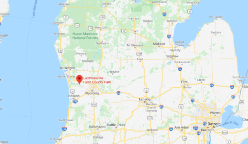 Map showing Eastmanville Farm County Park in Michigan, near the west coast, with surrounding cities and landmarks.