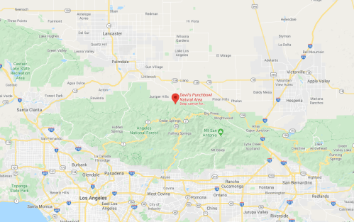 Map showing Devil's Punchbowl Natural Area, located northeast of Los Angeles, surrounded by mountains and nearby towns.