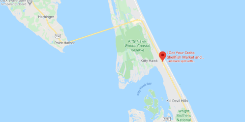 Map showing Kitty Hawk, North Carolina, highlighting "I Got Your Crabs Shellfish Market" near the coast.