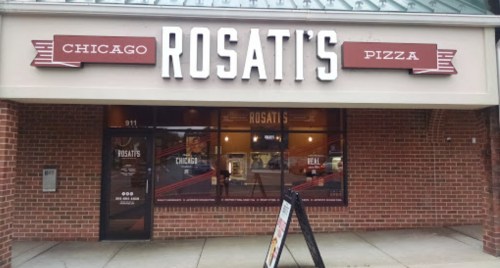 Exterior of Rosati's Pizza restaurant, featuring a brick facade and large signage with "Chicago Rosati's Pizza."