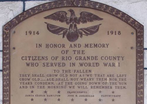 Plaque honoring Rio Grande County citizens who served in World War I, with an eagle emblem and memorial inscription.