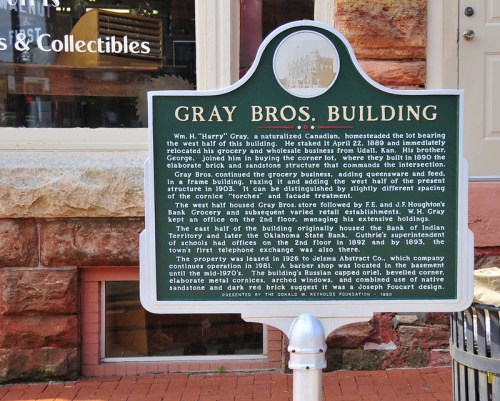 Historical marker for Gray Bros. Building, detailing its history and significance in the community.