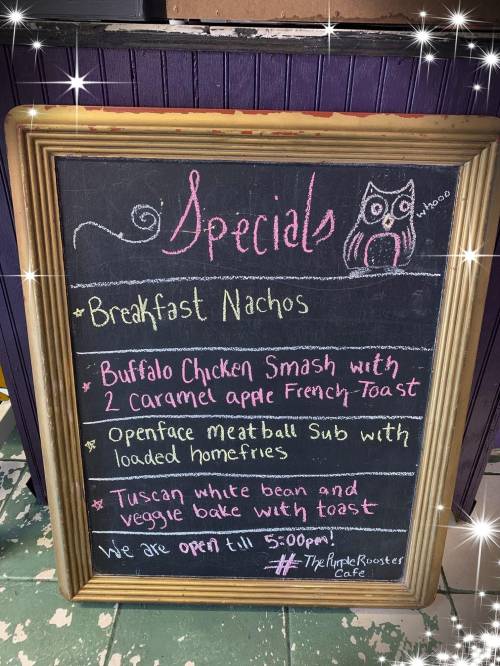 Chalkboard menu with specials: Breakfast Nachos, Buffalo Chicken Smash, Openface Meatball Sub, Tuscan White Bean Bake.