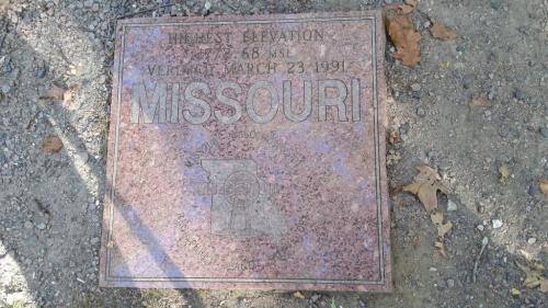 A stone marker indicating Missouri's highest elevation, 1,772 feet, verified March 23, 1991.