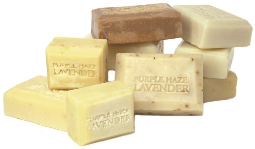 A collection of assorted lavender-scented soap bars in various shapes and sizes, stacked together.