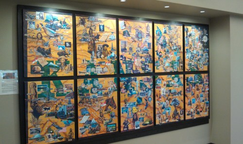 A colorful collage of historical images and artifacts displayed on a large board, showcasing various cultural elements.