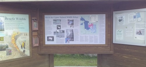 Information display at the Marais des Cygnes National Wildlife Refuge, featuring maps and wildlife details.