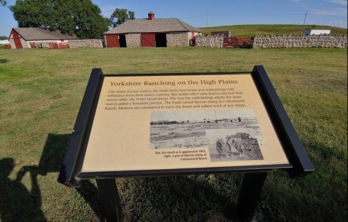 Sign about Yorkshire Ranching on the High Plains, with a ranch in the background and a historical photo at the bottom.