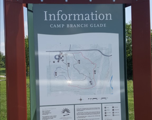 Information sign featuring a map of Camp Branch Glade, highlighting trails and points of interest.